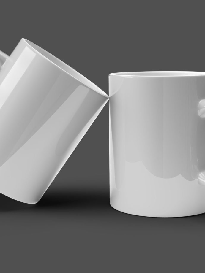 Pack of Two White Mugs Over Black Surface